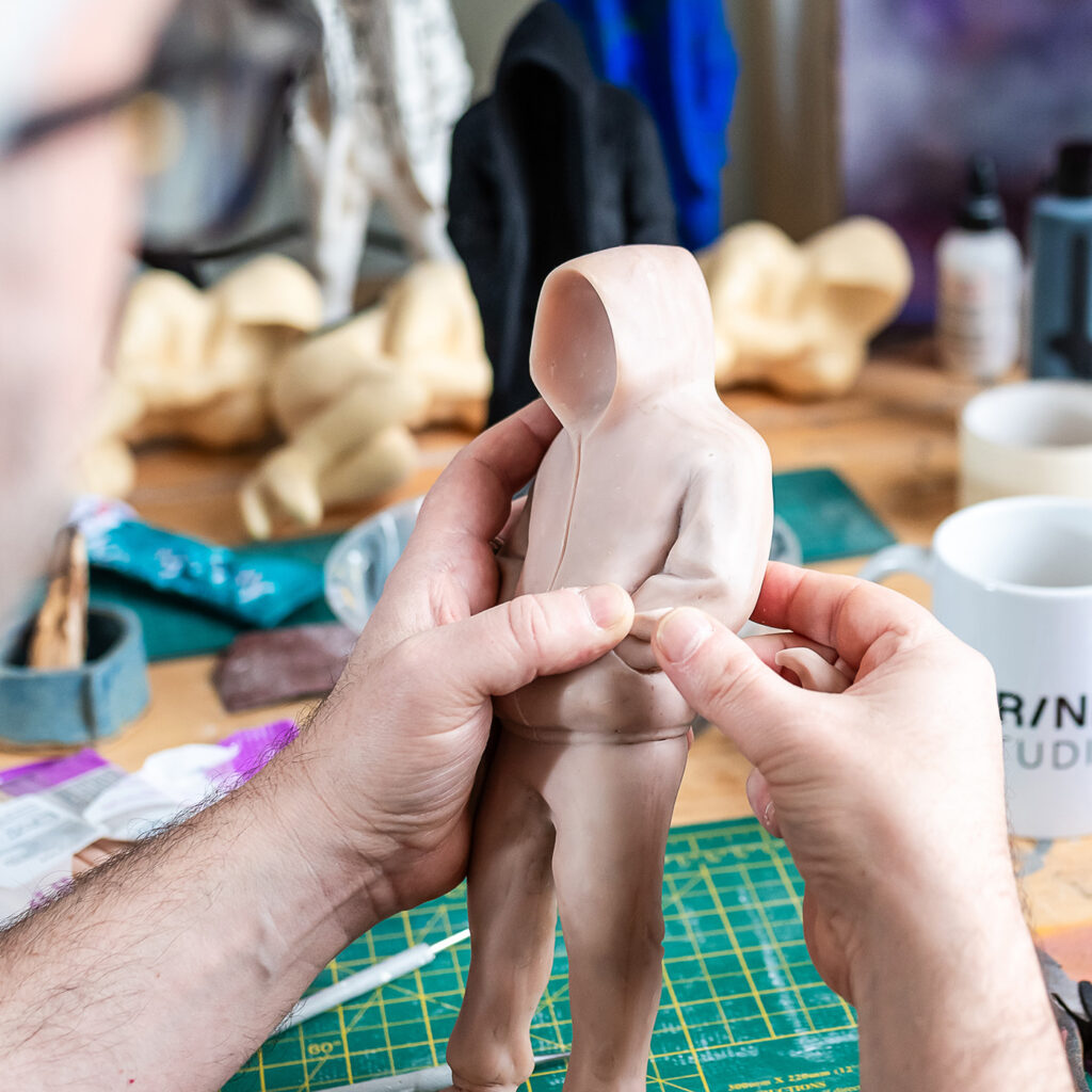 Rob Lenihan in the studio making an archetype sculpture